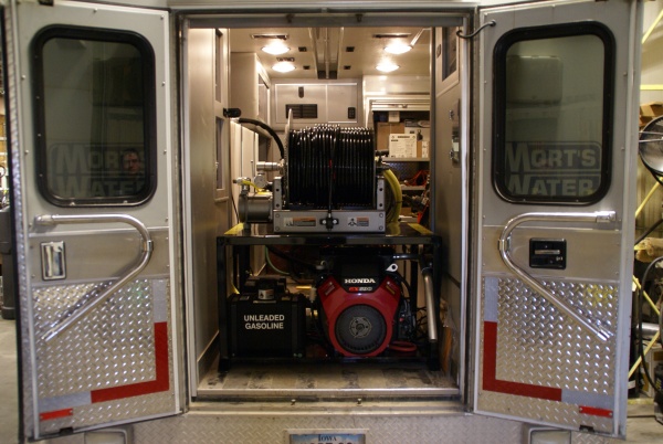Custom installation of a sewer jetter in a used ambulance