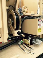 Military cement truck using hydraulic pressure washer
